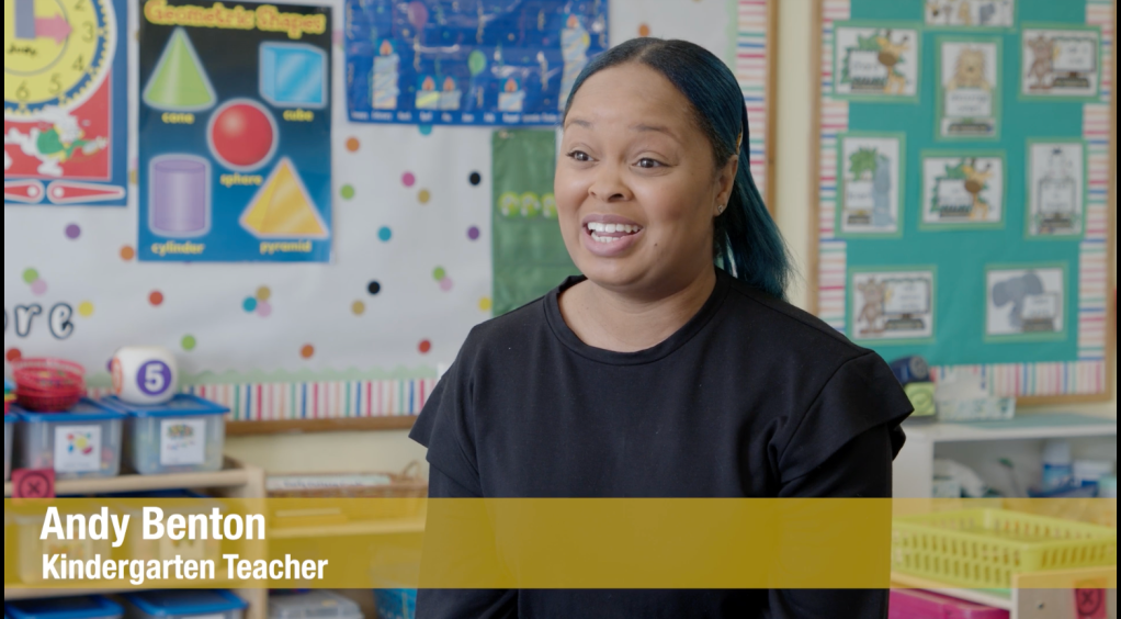 Screenshot of a video screen of a woman talking to the camera